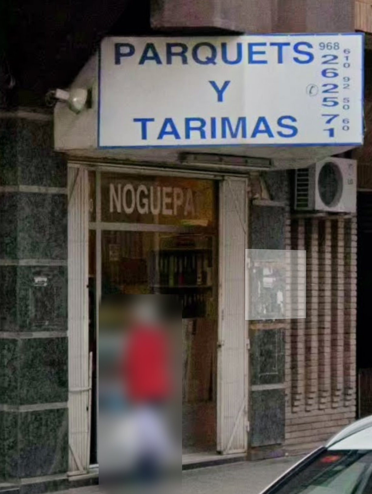 Fachada de la tienda Noguepar, Parquets y Tarimas, en Calle Pintor Pedro Flores 11, Murcia
